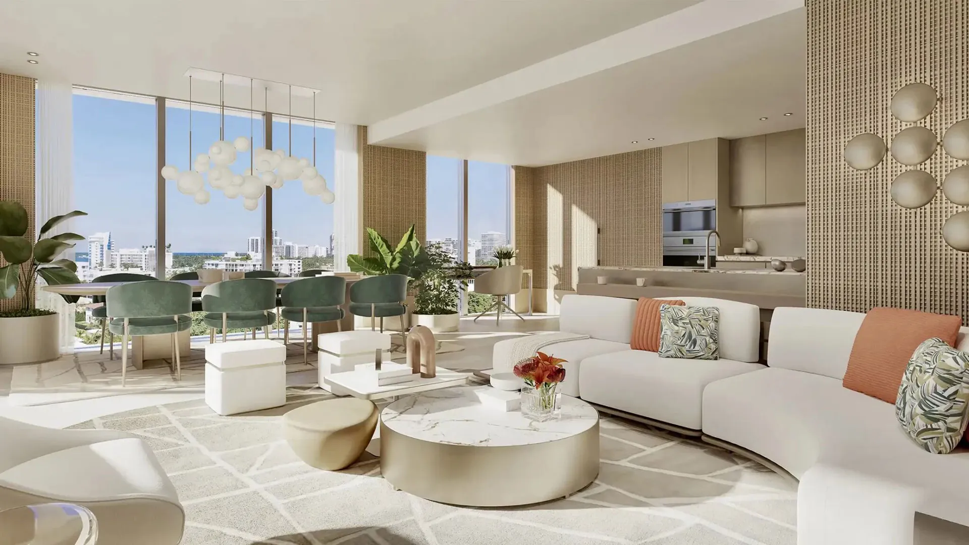 Salón principal de una residencia ORIGIN: asientos curvos sobre una alfombra estampada, comedor al fondo y ventanales de piso a techo hacia la bahía.