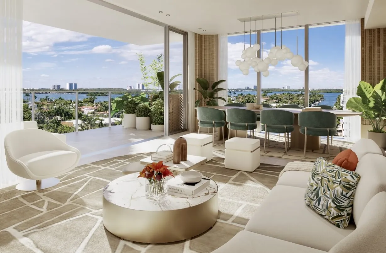 Salón y comedor de una residencia ORIGIN con vidrios corredizos de piso a techo abiertos a una terraza sobre la bahía.